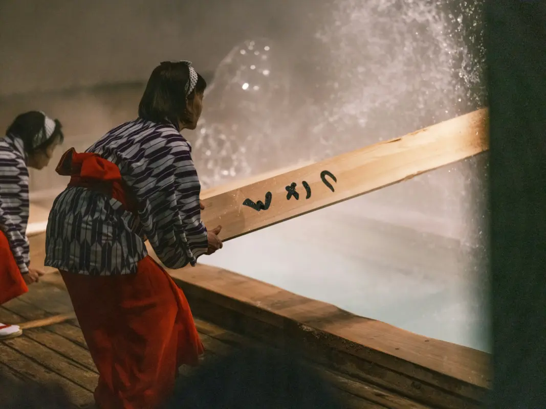 Yumomi hot spring performance in Japan, cultural experience available during private guided tours
