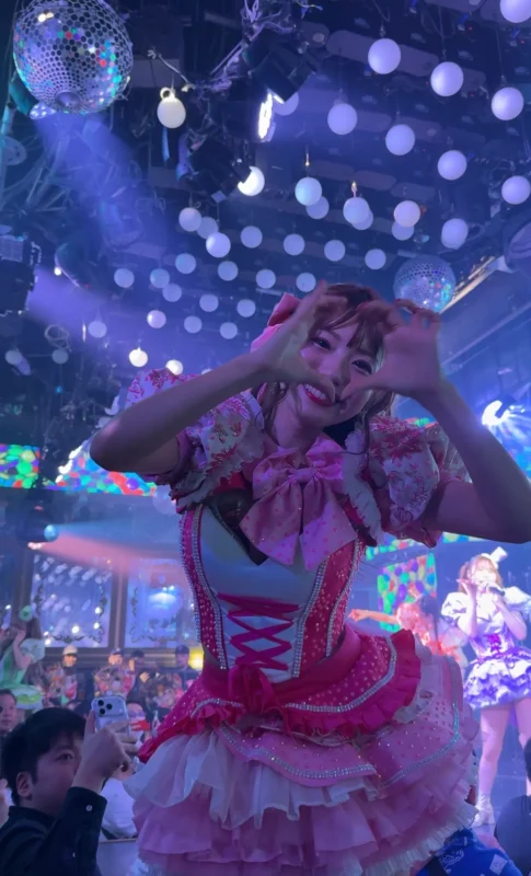 Performer interacting with the audience during a burlesque show at Rokusan Angel