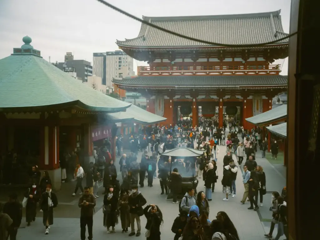 Crowded Asakusa temple area in Tokyo with international travelers