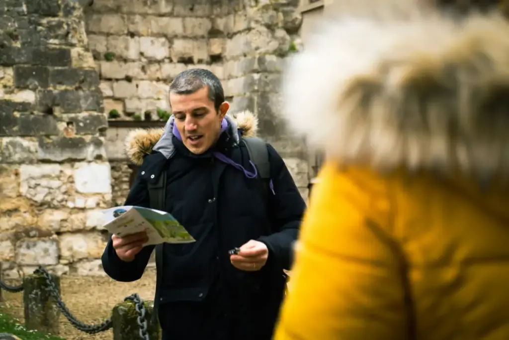 English speaking tour guide explaining the area during a walking tour 
