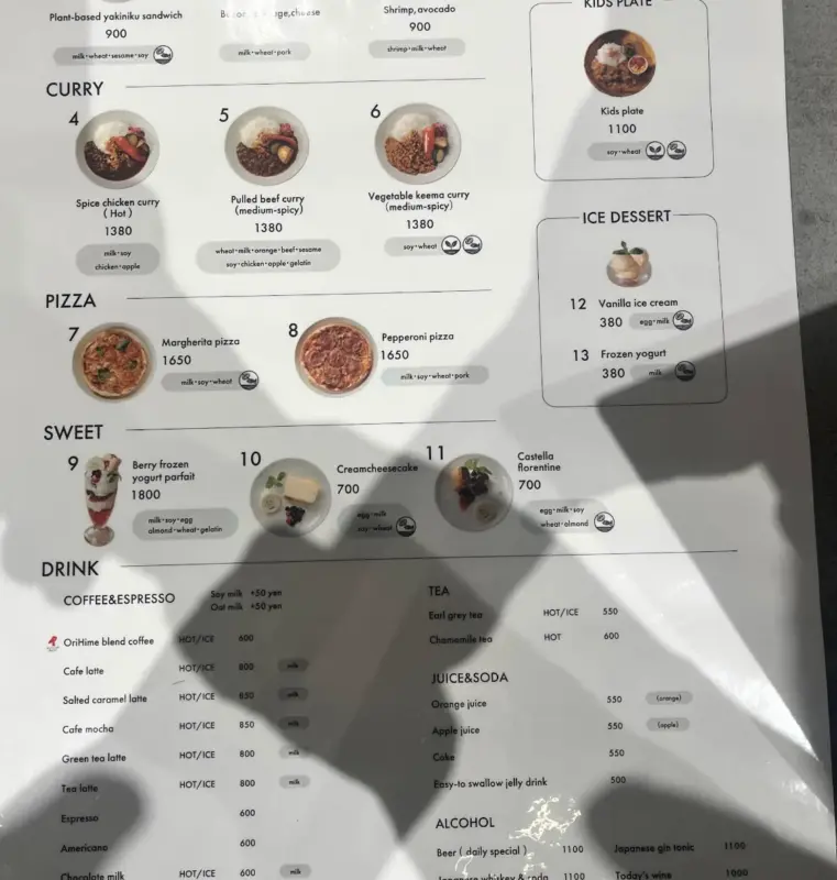 スクリーンショット 2025-12-28 20.45.42 Food and drink menu at DAWN Avatar Robot Cafe, including curry, pizza, desserts, and drinks