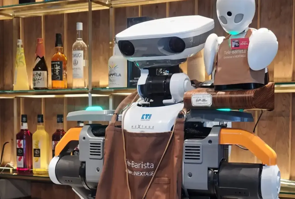 スクリーンショット 2026-01-04 17.44.39 Close-up of an OriHime avatar robot used for remote hospitality at DAWN Cafe
