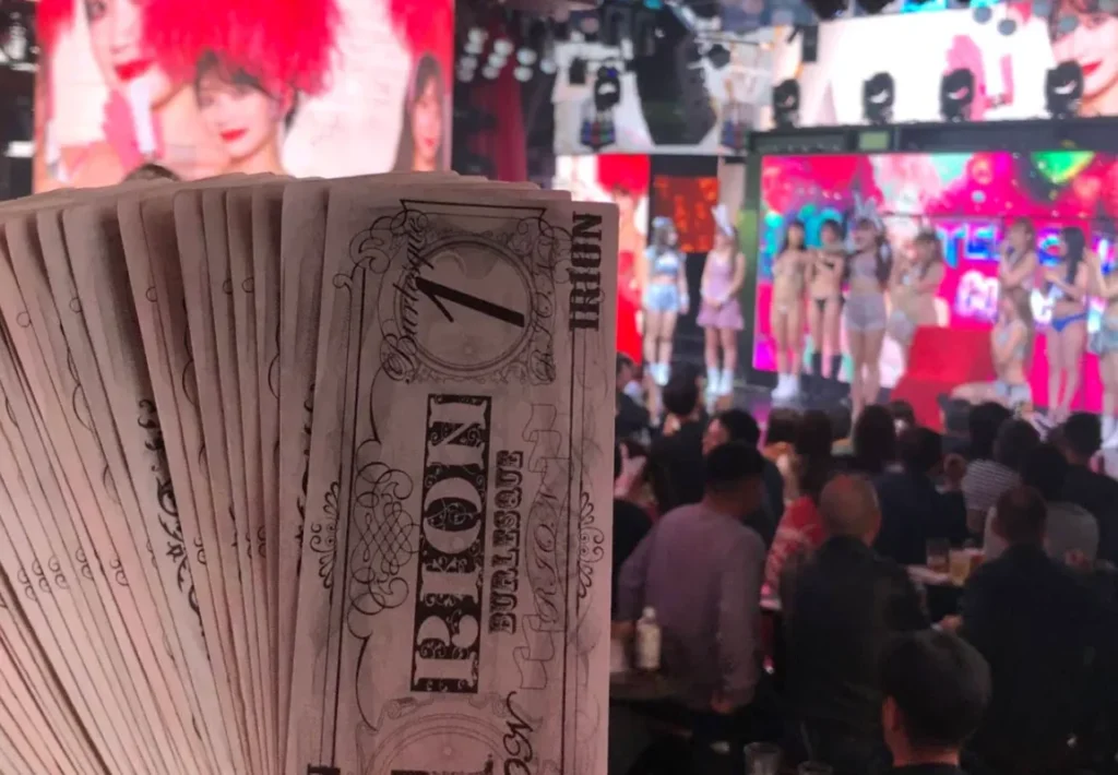 Audience watching a live burlesque show at Rokusan Angel in Japan