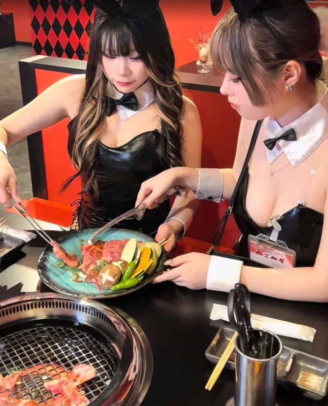 Bunny girl staff assisting with grilling yakiniku at Yakiniku and Bunny Girl Tokyo