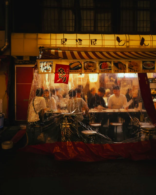 laura-barry-WvSXctqZ4UI-unsplash Small local izakaya in Japan with counter seating visible from outside