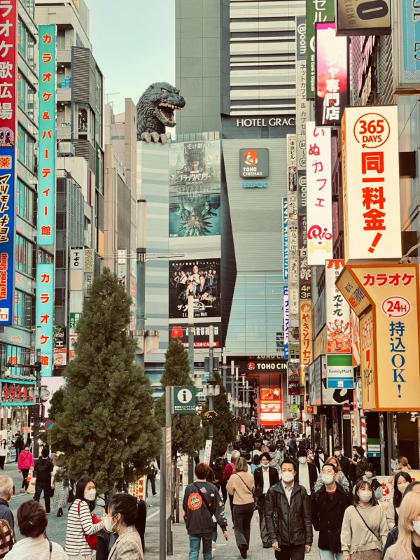 Kabukicho street in Shinjuku with Godzilla Head above Toho Cinema, iconic Tokyo sightseeing spot