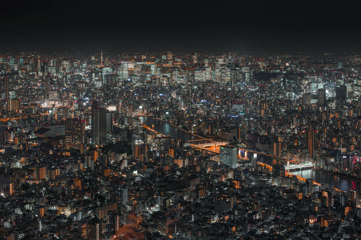 Tokyo skyline at night with illuminated buildings and city lights