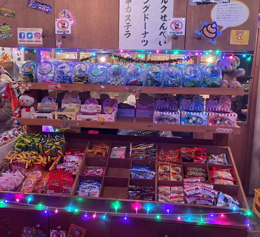 Retro Japanese candy shop bar in Tokyo with nostalgic snacks and colorful decorations