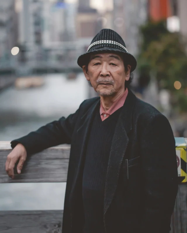 ash-edmonds-AxtUIbOIPBE-unsplash Japanese older man representing Ossan Rental in Japan