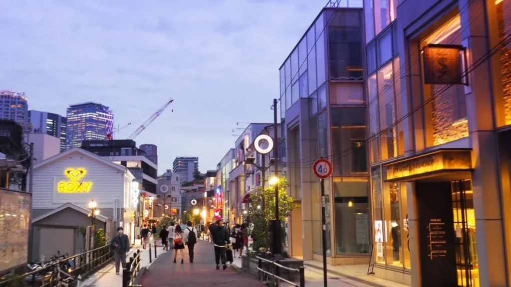Cat Street in Shibuya during the early evening with shops and pedestrians
