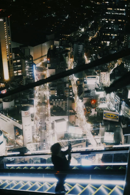 Night view of Shibuya streets from a high-rise observation deck