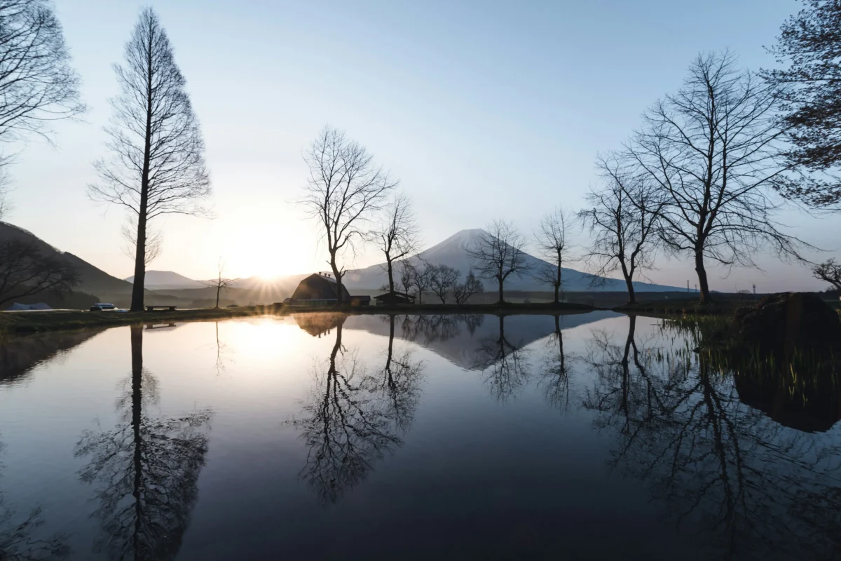 ryoji-iwata-LJKUOSS39rs-unsplash (1) Mount Fuji reflected in a quiet lake at sunrise