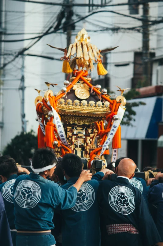 atul-vinayak-SUFmd7YcwQc-unsplash Japanese mikoshi portable shrine carried during a traditional festival