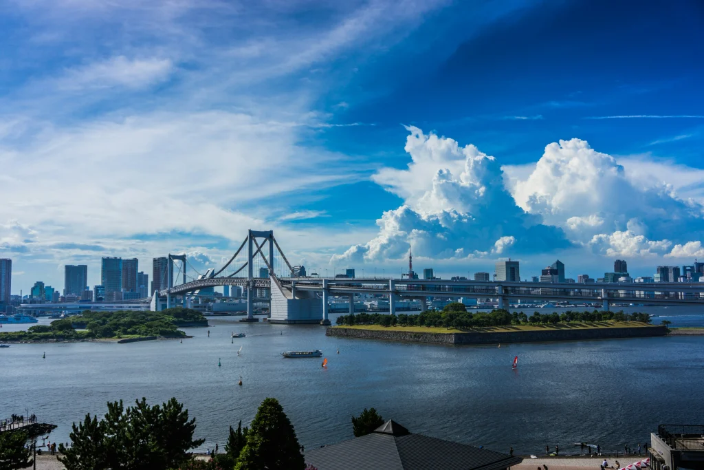 cem-ersozlu-oWfnERydvCk-unsplash Rainbow Bridge and Tokyo Bay under a blue summer sky