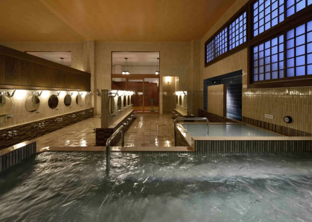 Soft-water baths and washing area inside Mannenyu sento in Shinjuku