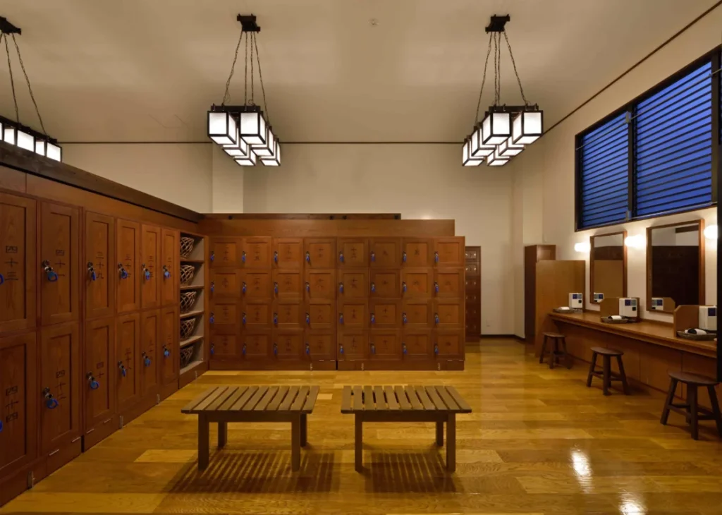 Wooden changing room with lockers inside Mannenyu public bath