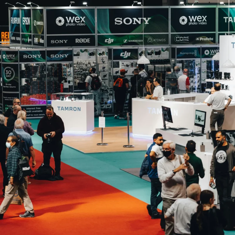 Business visitors at a technology trade show exhibition