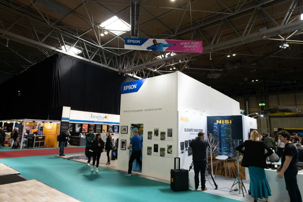 Exhibitors and visitors at a business trade show