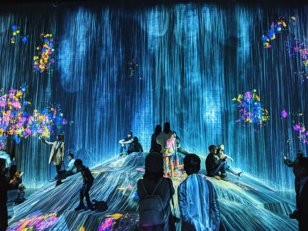Visitors inside an immersive digital art installation in Tokyo